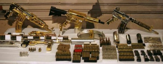 More Gold machine guns and pistols - most were never fired, just held for collection value.