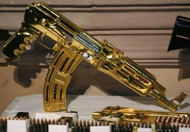 More Gold machine guns and pistols - most were never fired, just held for collection value.